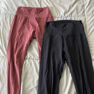 2 pairs of Buff Bunny leggings - high waist black and rose color, size medium.